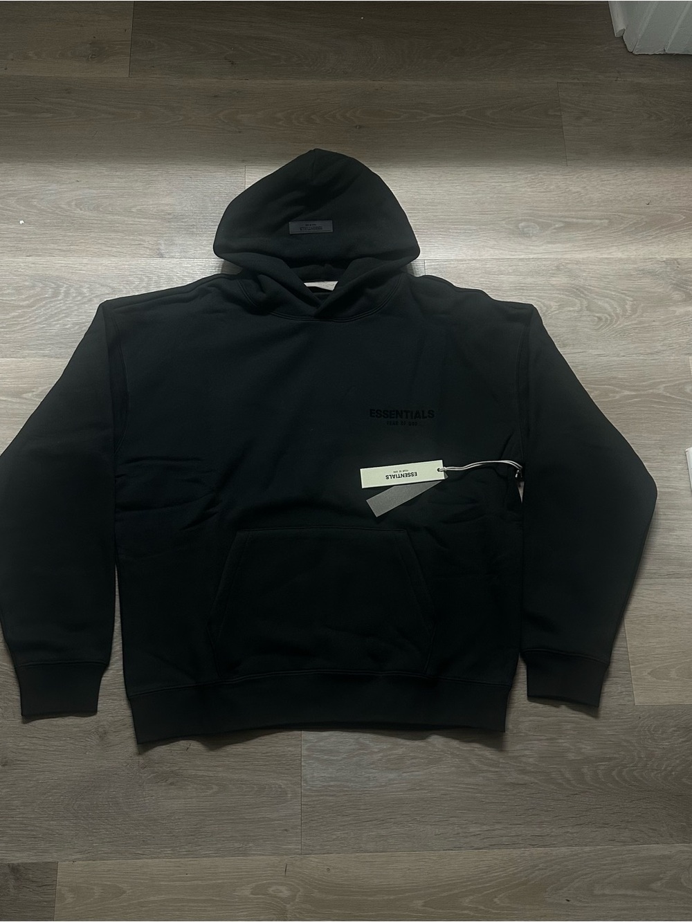 Essentials Black Pullover Hoodie with Chest Logo